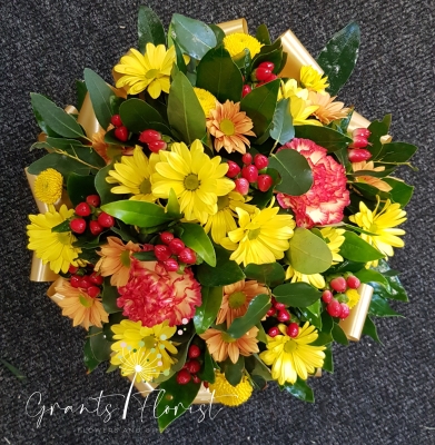 Funeral posy in autumnal shades